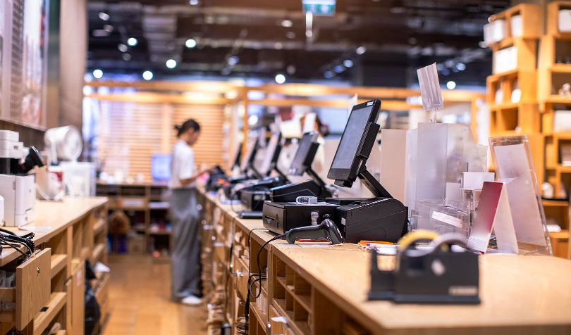 Retail counter with tablet point of sale terminals, printers and barcode scanners